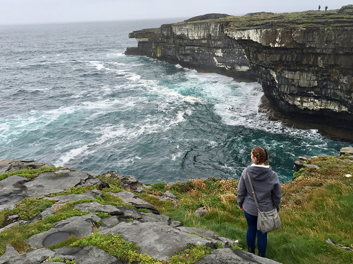 A student overlooking the ocean in Aran Islands in Galway, Ireland.