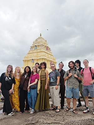 Students in front of a traditional style building in Bengaluru, India.