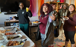 Five students at the University of Maine Diversity Education Abroad fair.