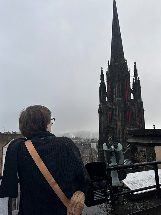 Trey Kirkpatrick admiring historic buildings while traveling.