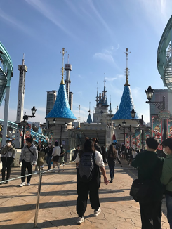 Angelica walking at an amusement park in South Korea.