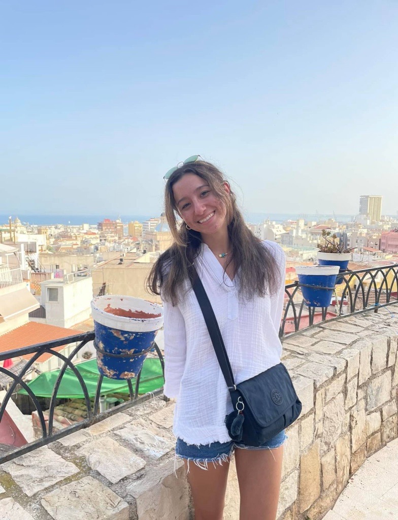 Ariana standing with a view of the city while study abroad in Alicante, Spain.