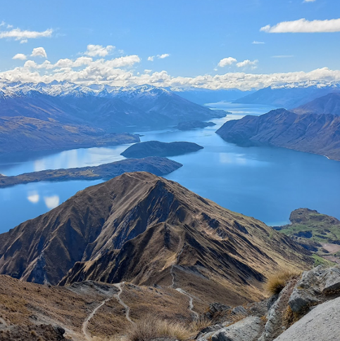 Aerial view of mountains and a lake in New Zealand.