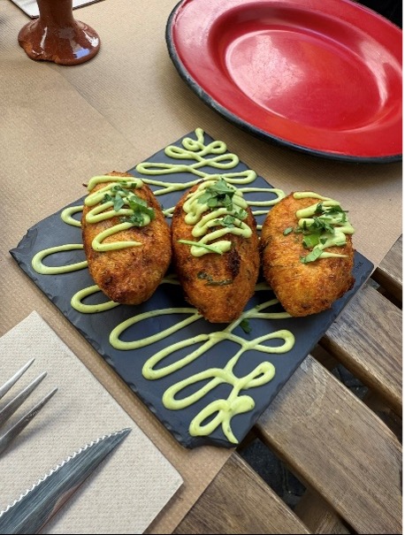 Salt cod fritters on a plate in Lisbon, Portugal.