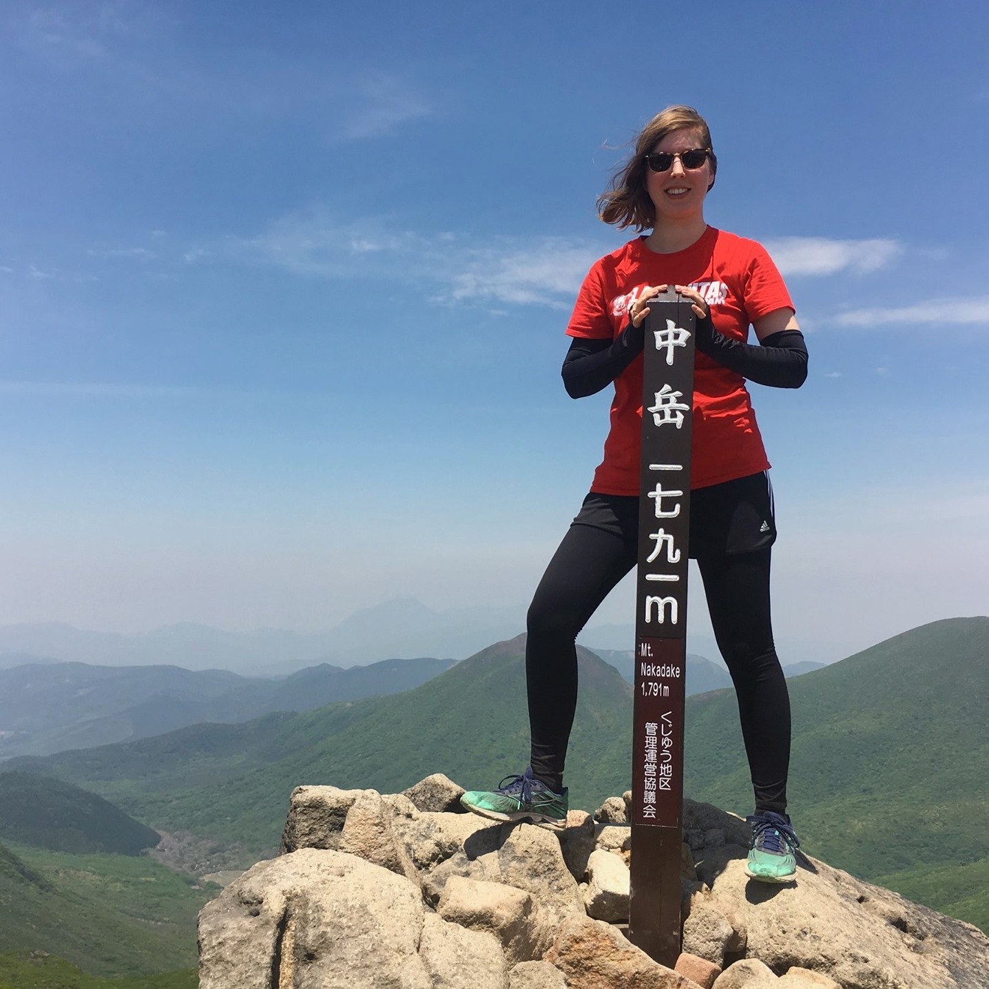 Caroline at the top of Mt. Nakadake in Aso, Japan.