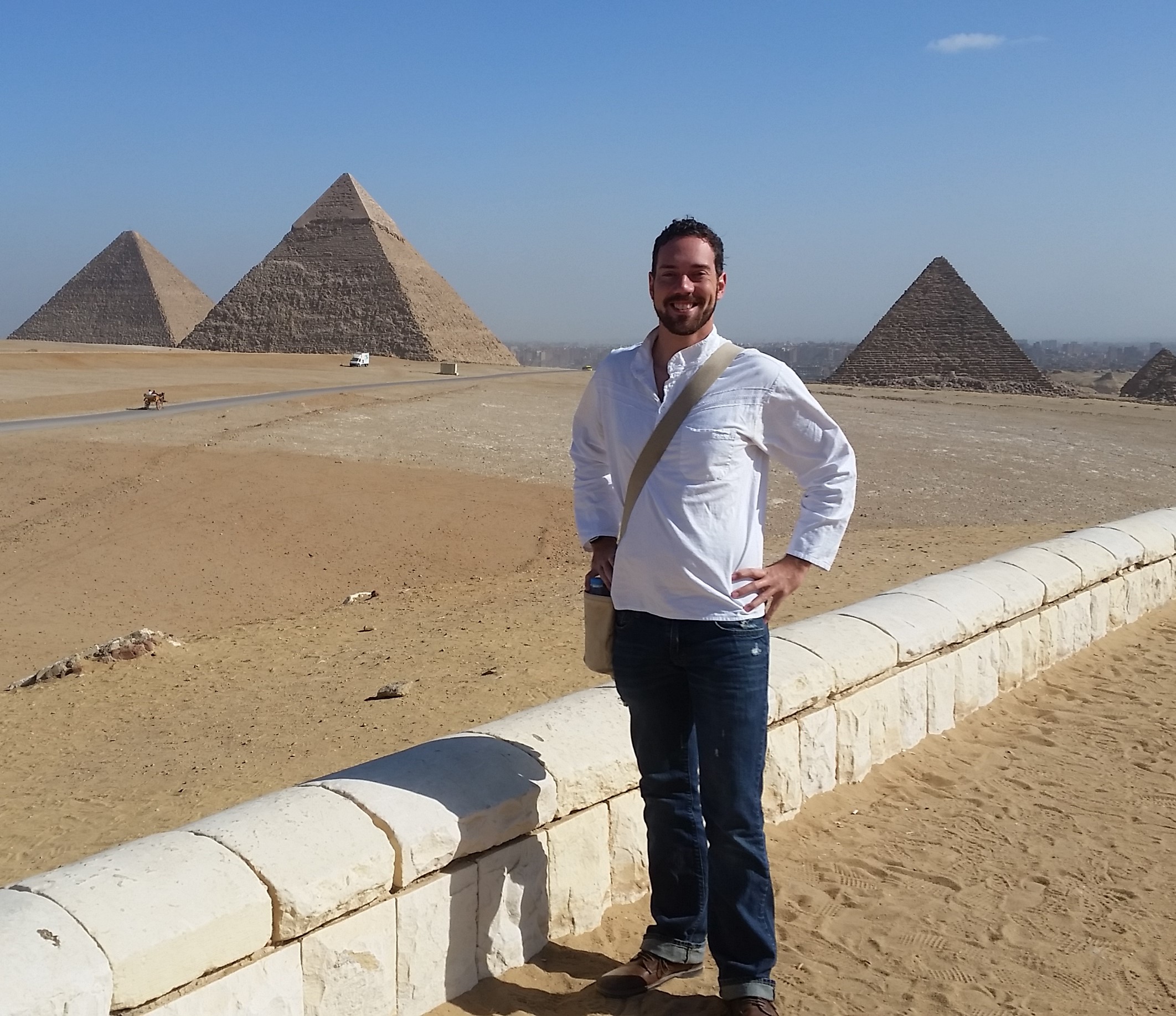 Charles in front of the Great Pyramids in Cairo, Egypt.