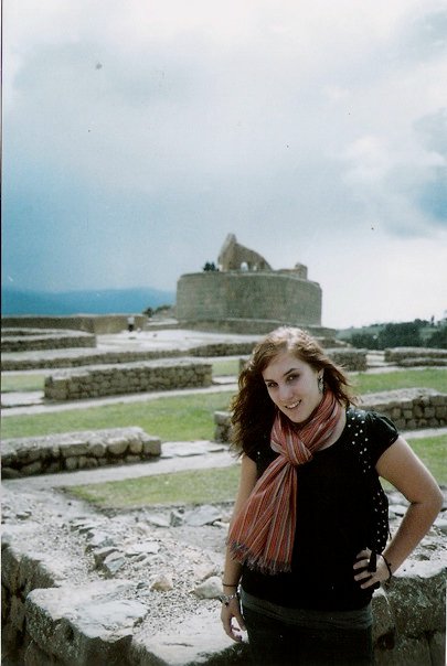 Kelsey standing in front of ancient Incan ruins in Ingapirca, Ecuador.