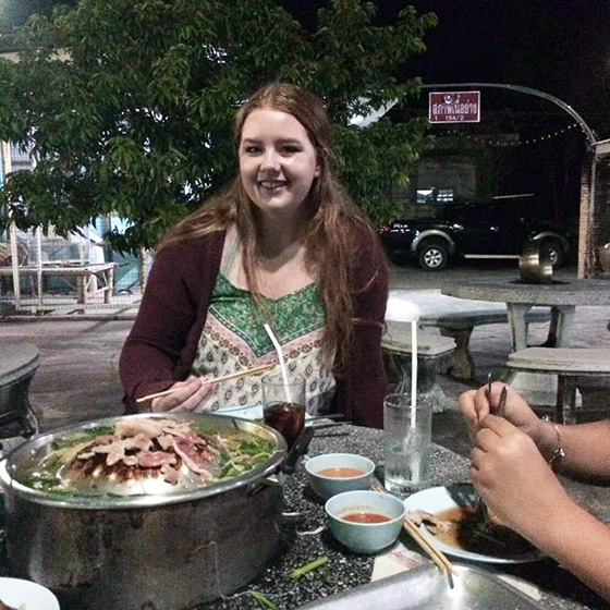 Phoebe enjoying delicious street food in Thailand.