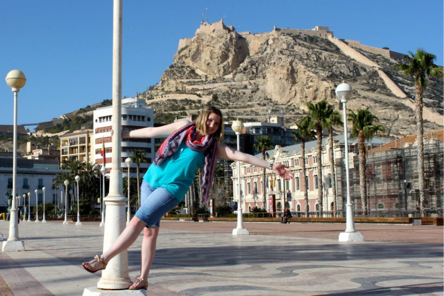 Shani Sullivan twirling around a light post in Alicante, Spain.
