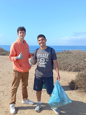 USAC students cleaning up the beach in Alicante, Spain on World Volunteer Day