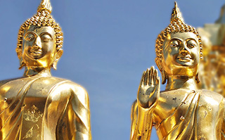 Golden statues at a Wat in Thailand.