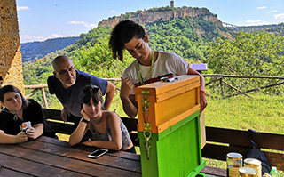 Students learning about beehives in Viterbo, Italy.