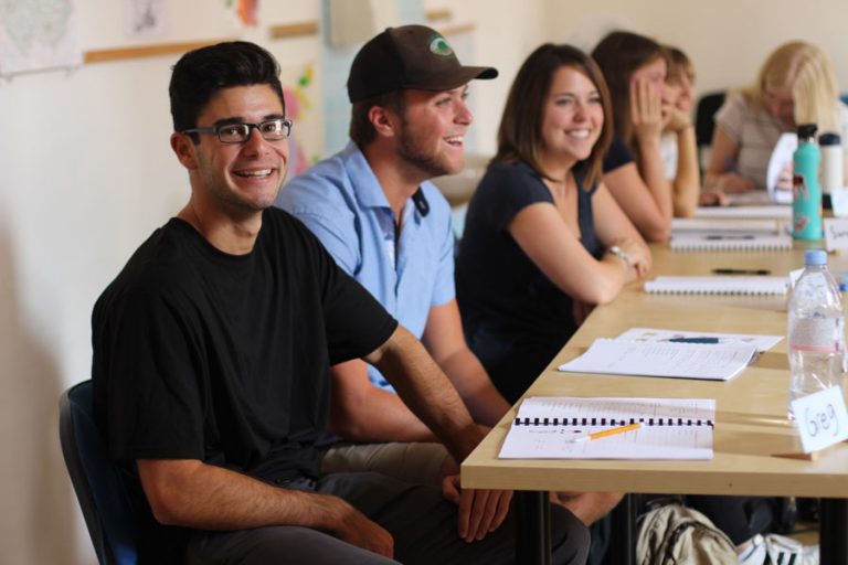 Students sitting at desks in a classroom.