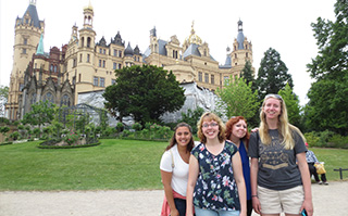 Students standing in front of a castle in Germany.