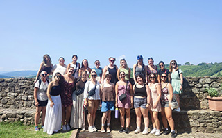 A group of students at an overlook in Reggio Emilia, Italy.