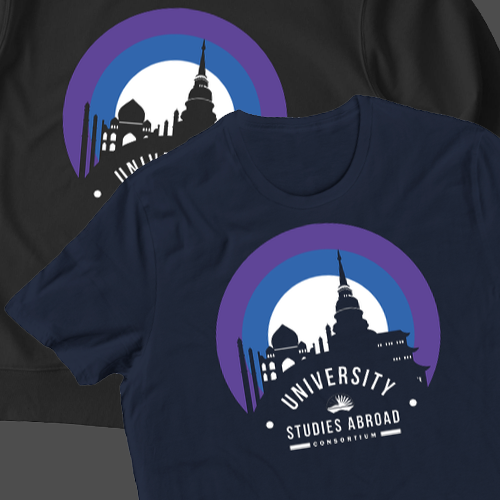 A flat lay of a USAC branded sweatshirt and two shirts