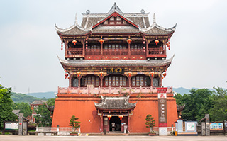 An orange pagoda building in Luodai Ancient Town, China.