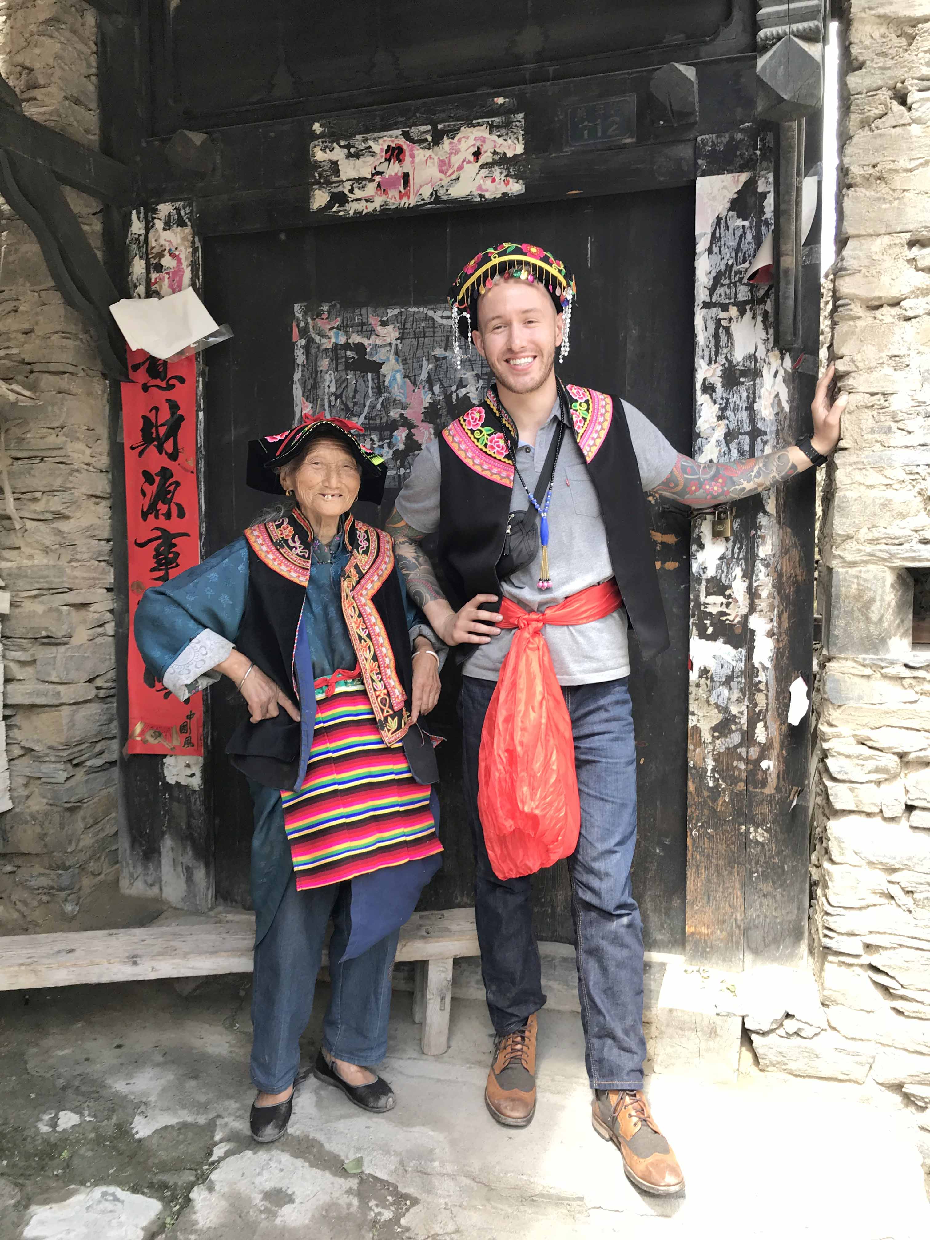 A student with a local woman in the Taoping Qiang Village in China.