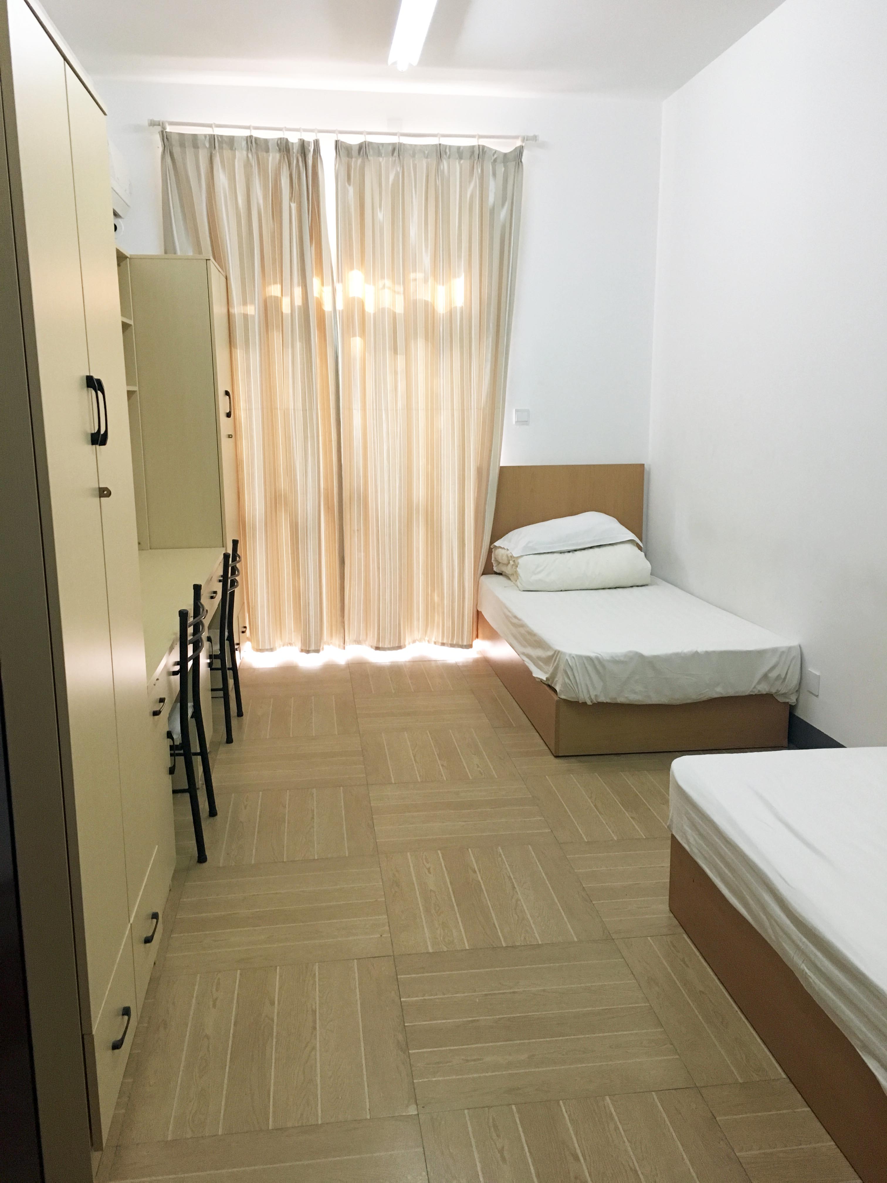 Shared bedroom in student residence hall in Shanghai, China.