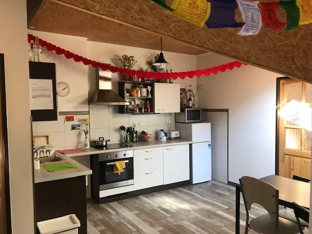 Kitchen and dining area in student apartment in Prague, Czech Republic.