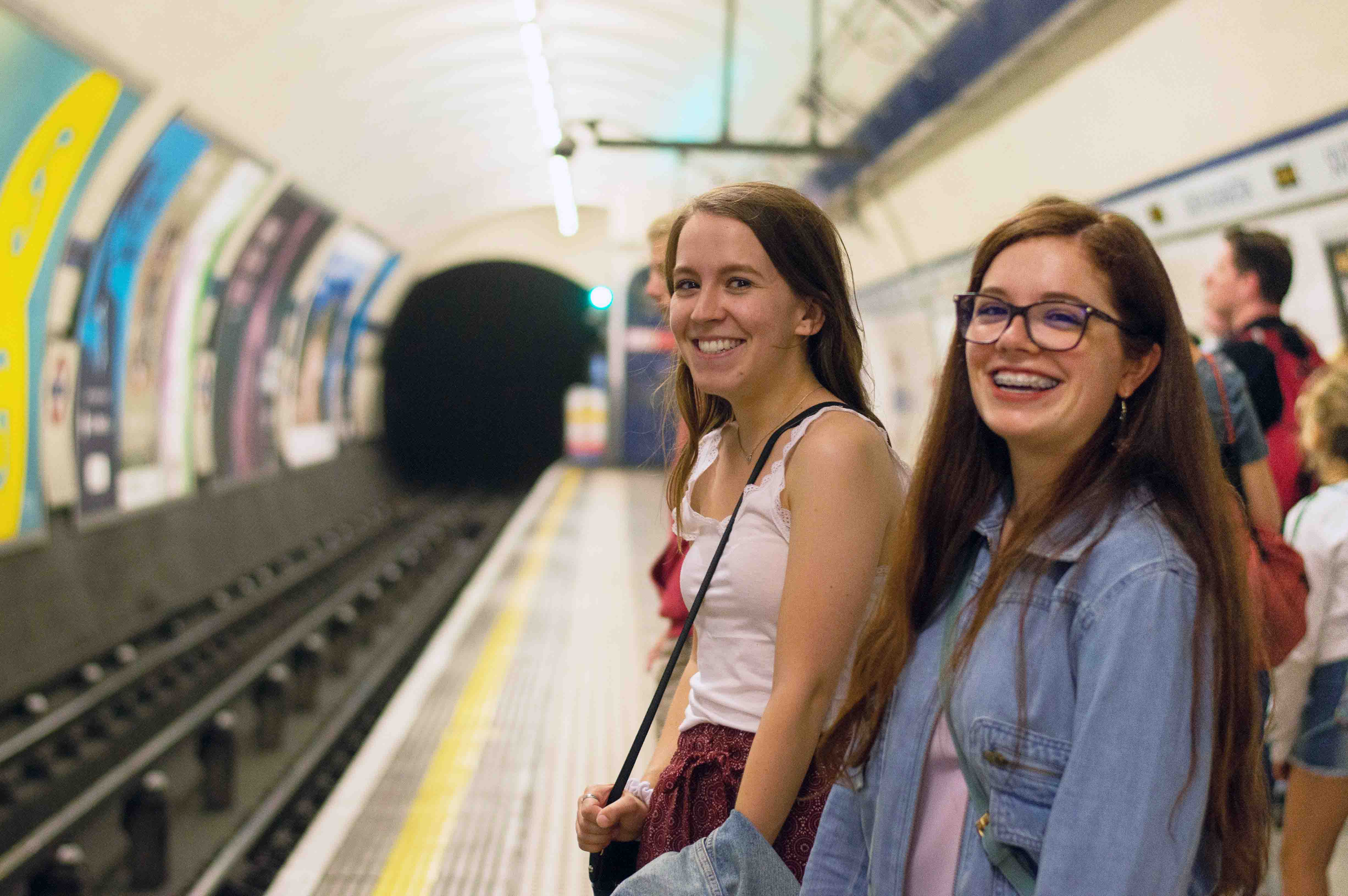 Two students in the London tube in London, England.