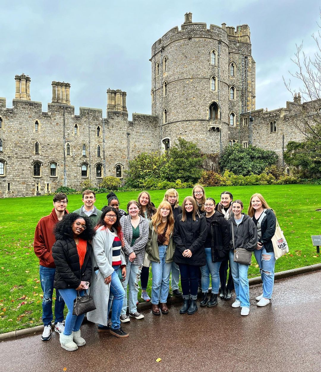 Students on a field trip standing in front of Windsor Castle in England.