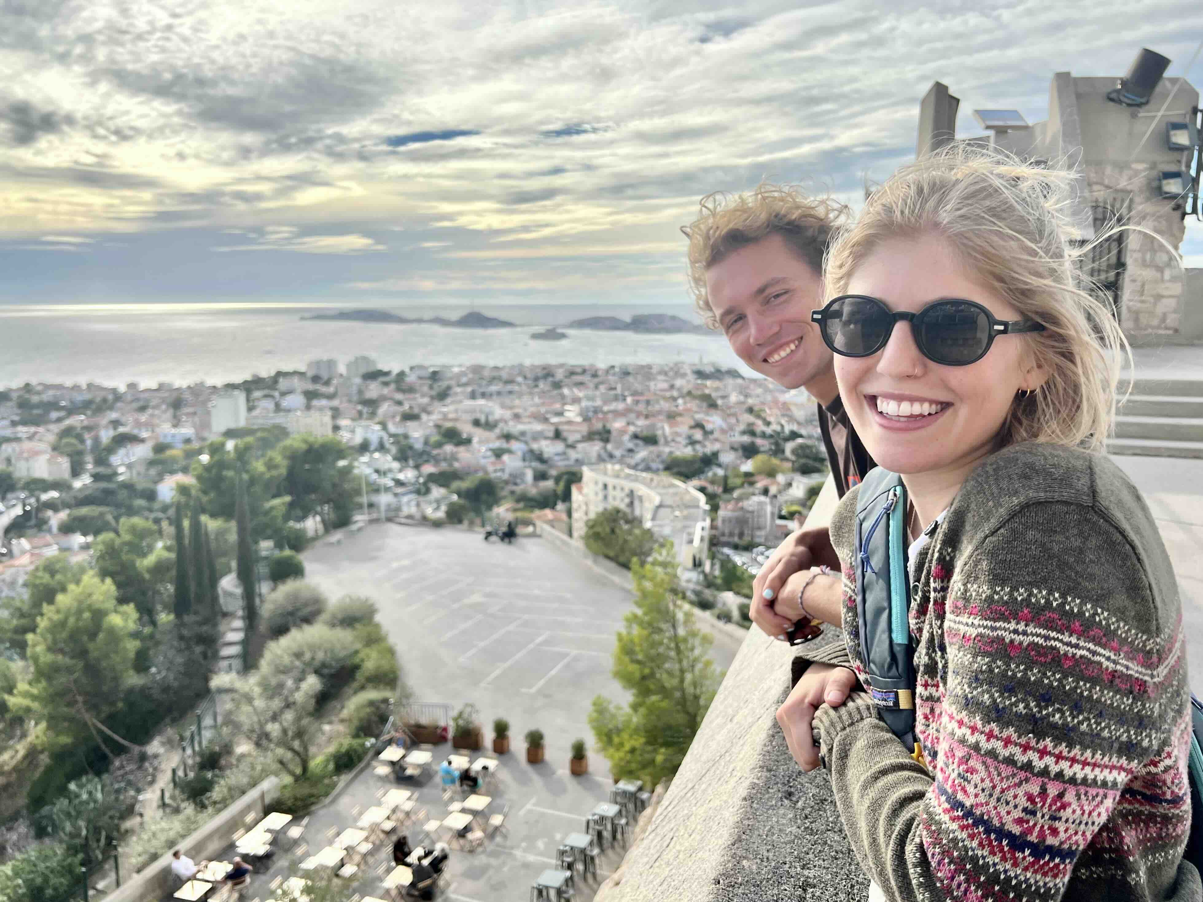 Two students overlooking the city and sea in Marseille, France.