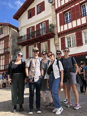 Students posing in front of historic Basque homes in the French Basque country.