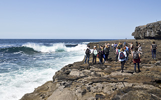 Students exploring along the coast of Aran Island in Ireland.