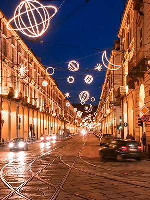 Christmas lights over the streets of Torino, Italy at night.