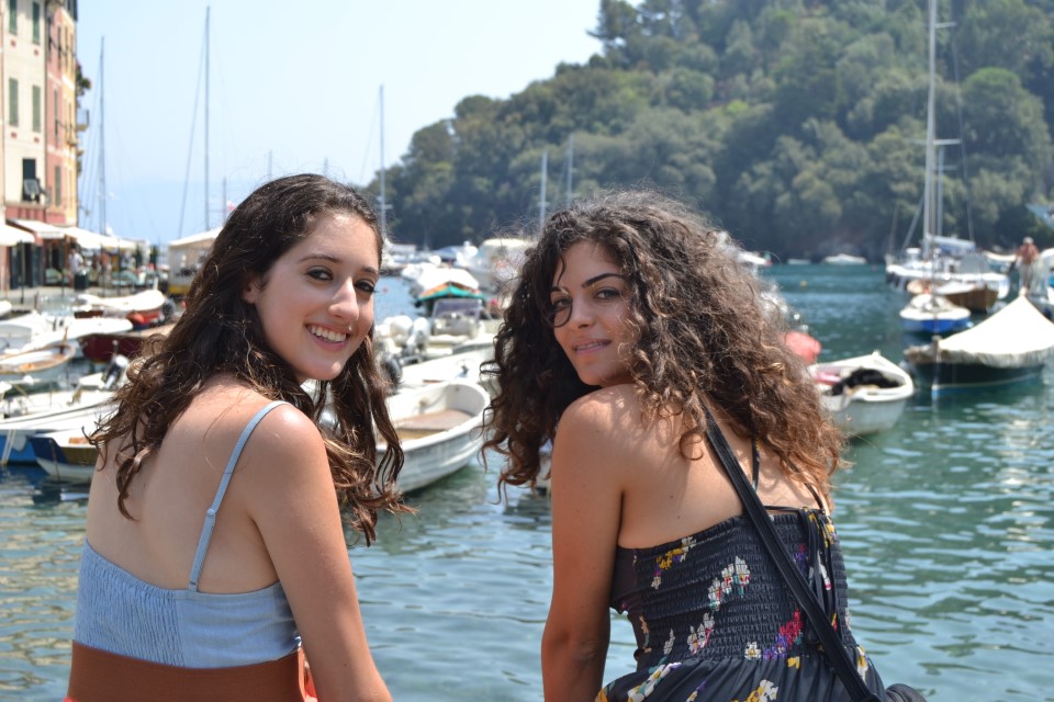 Two women enjoying the view of the Italian Riviera.
