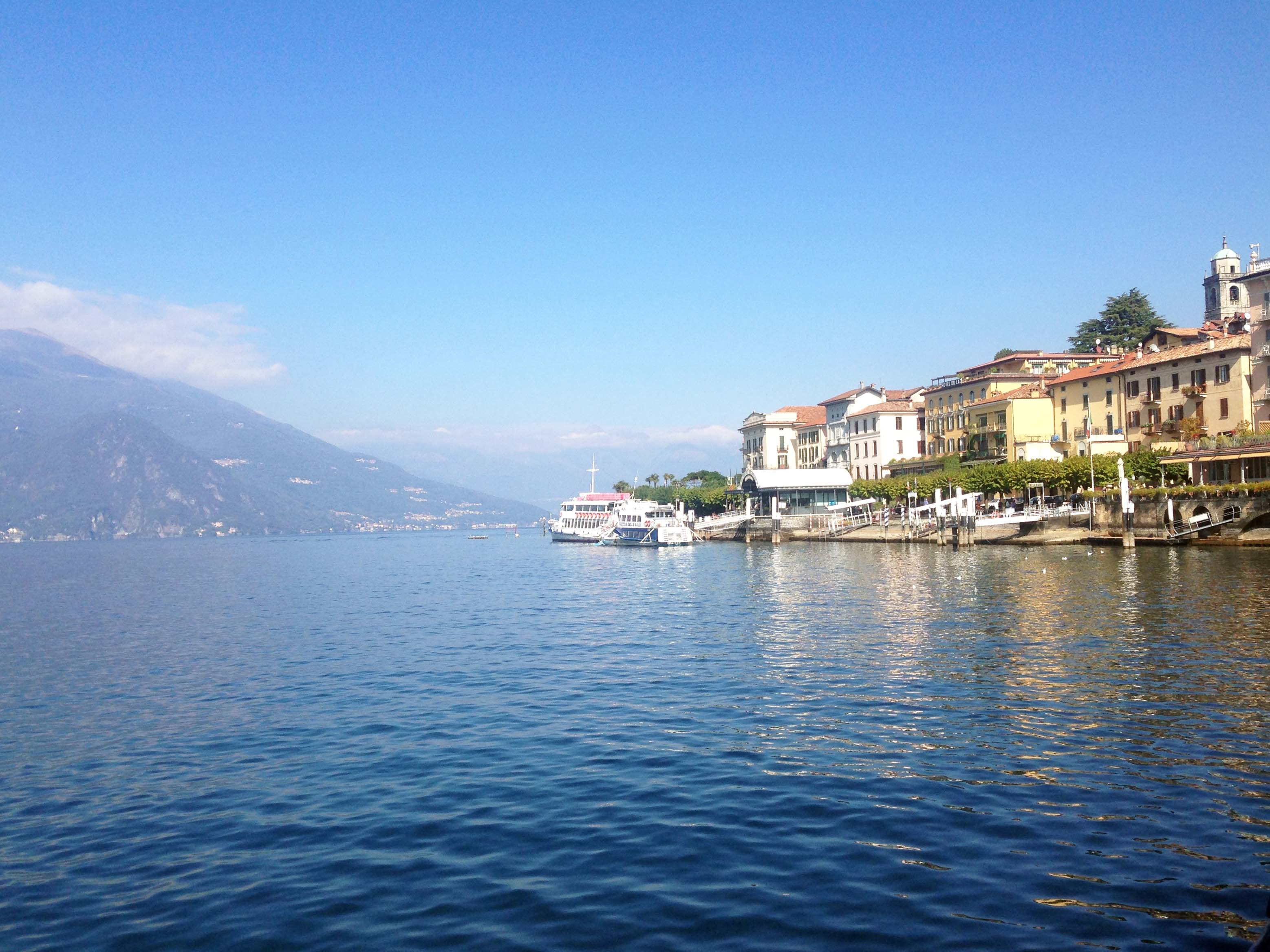 A view of the beautiful blue waters and picturesque buildings on Lake Como, Italy.