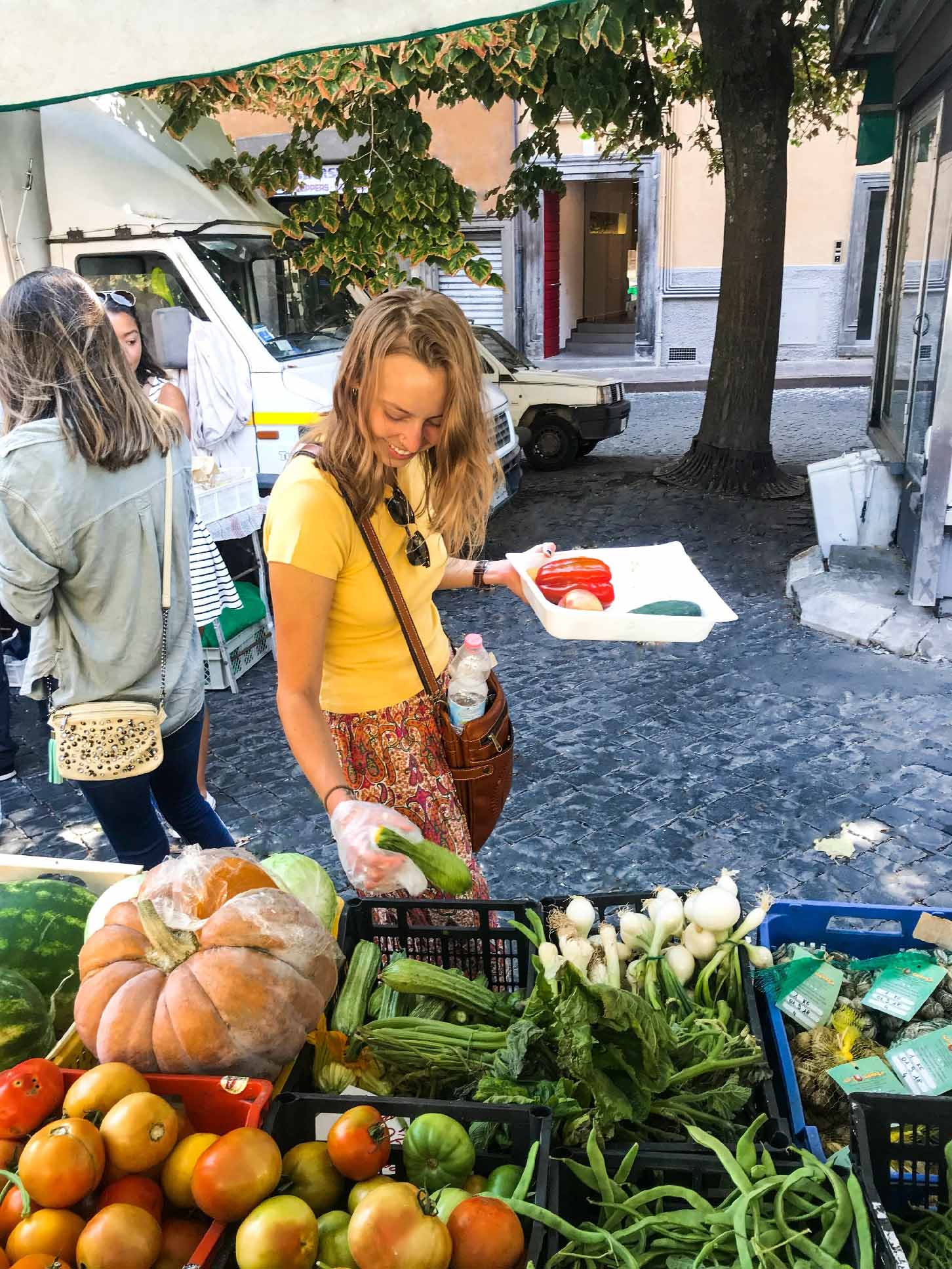 Student picking out local produce at the Saturday Market in Viterbo, Italy.