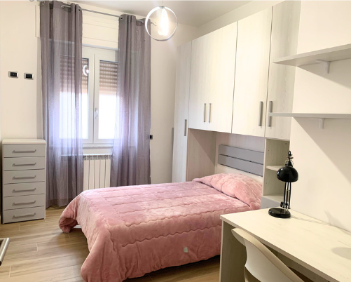 Bedroom in the student apartment housing in Viterbo, Italy.