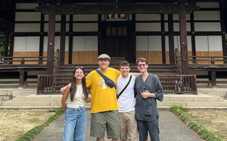 Students outside the Takehara Temple in Hiroshima, Japan.