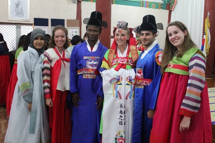 A group of people at the Korean Confucian School dressed in traditional Korean attire in Gwangju, Korea.