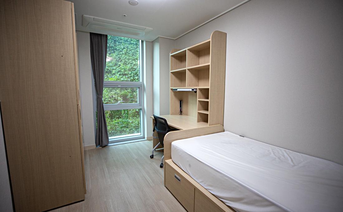 Bedroom in student dorm in Seoul, Korea.
