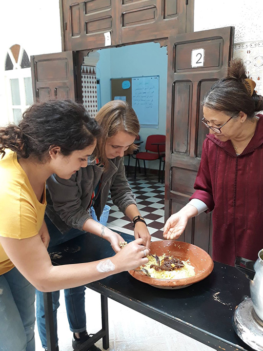 Students taking a cooking class while studying abroad in Rabat, Morocco.