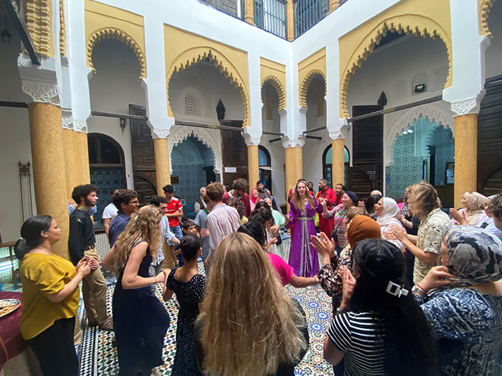 Students and staff dancing in the hall at the Center for Cross Cultural Learning in Rabat, Morocco.