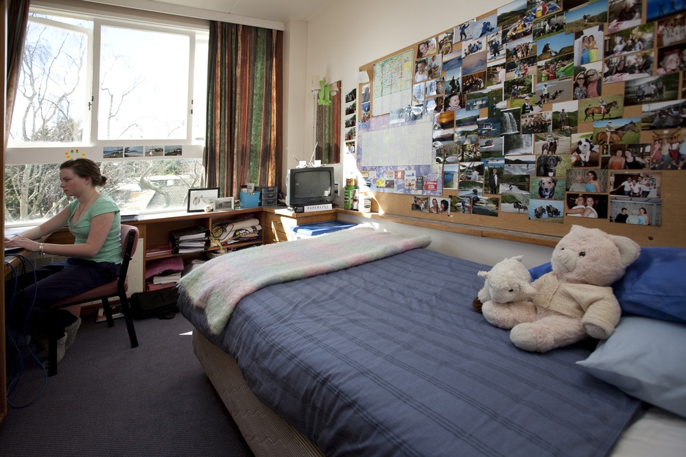 A student in a bedroom in Colombo Hall on the Manawatu Campus of Massey University in Palmerston North, New Zealand.