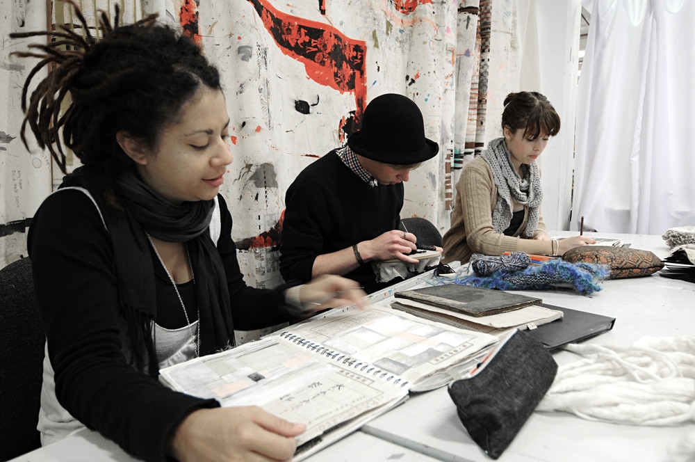 Three students in the textile class on the Wellington Campus of Massey University in Wellington, New Zealand.