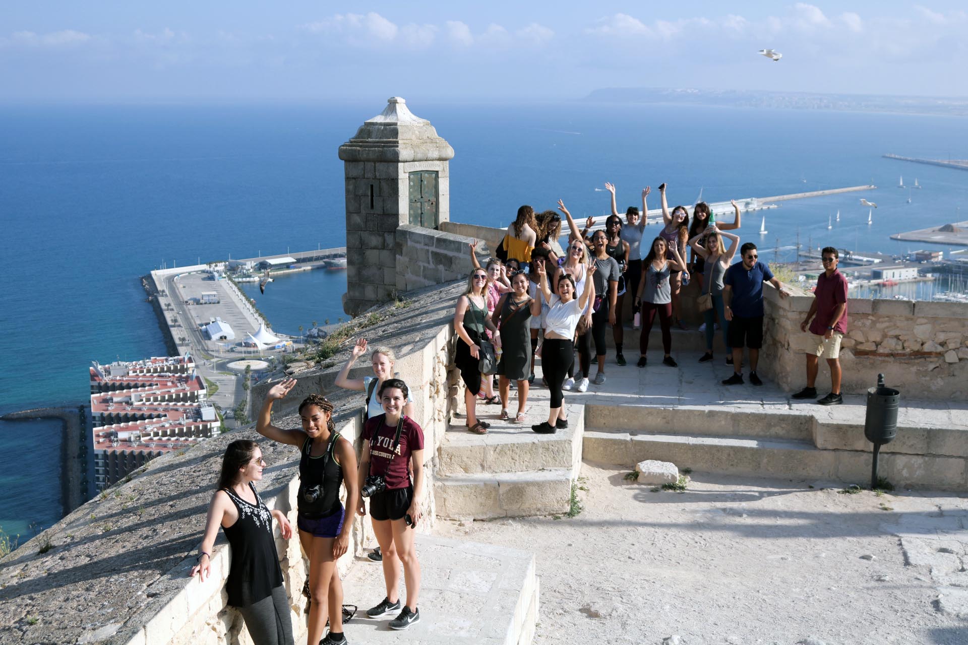 Students overlooking the city of Alicante, Spain.