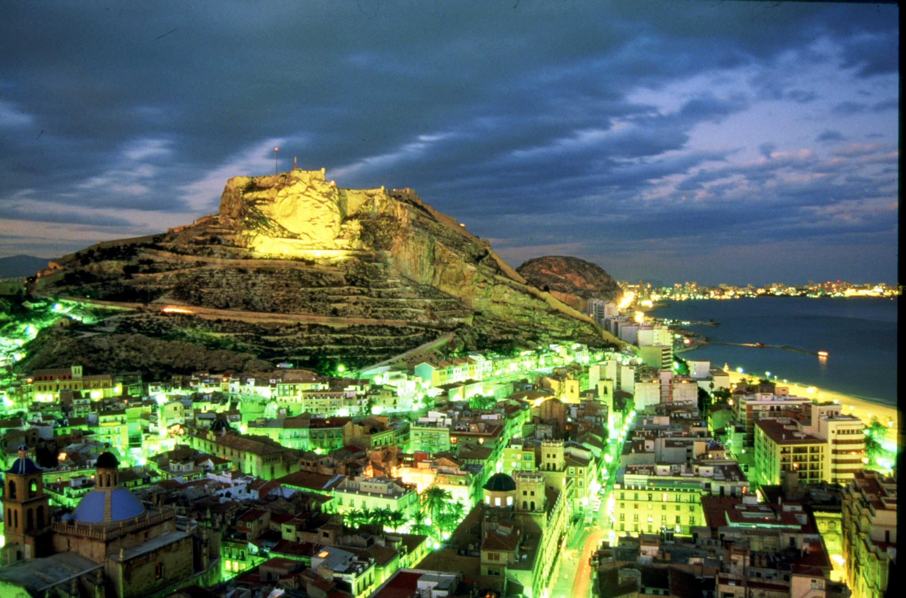 A view of the Old Quarter and Alicante Castle at night in Alicante, Spain.