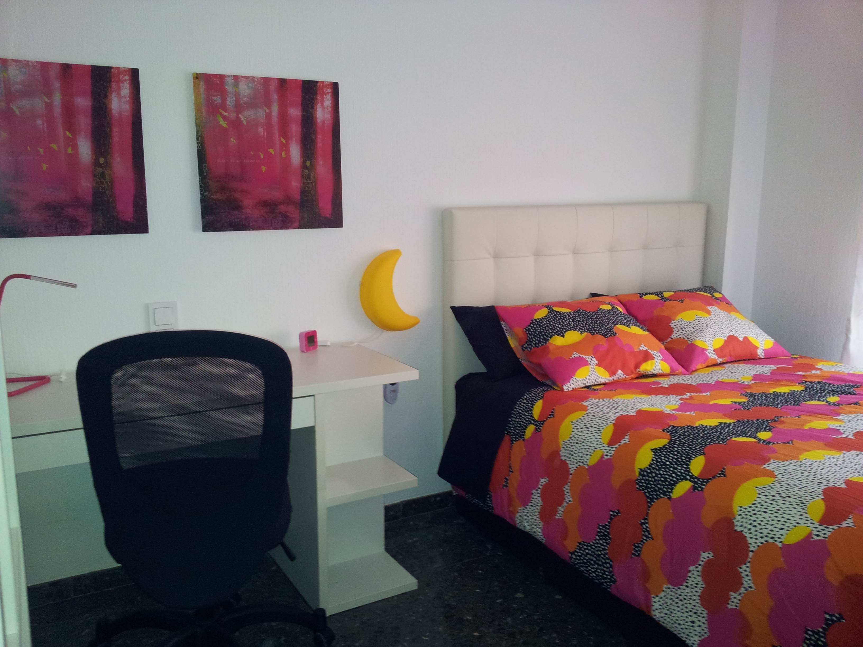 A bedroom in a shared apartment student housing in Alicante, Spain.