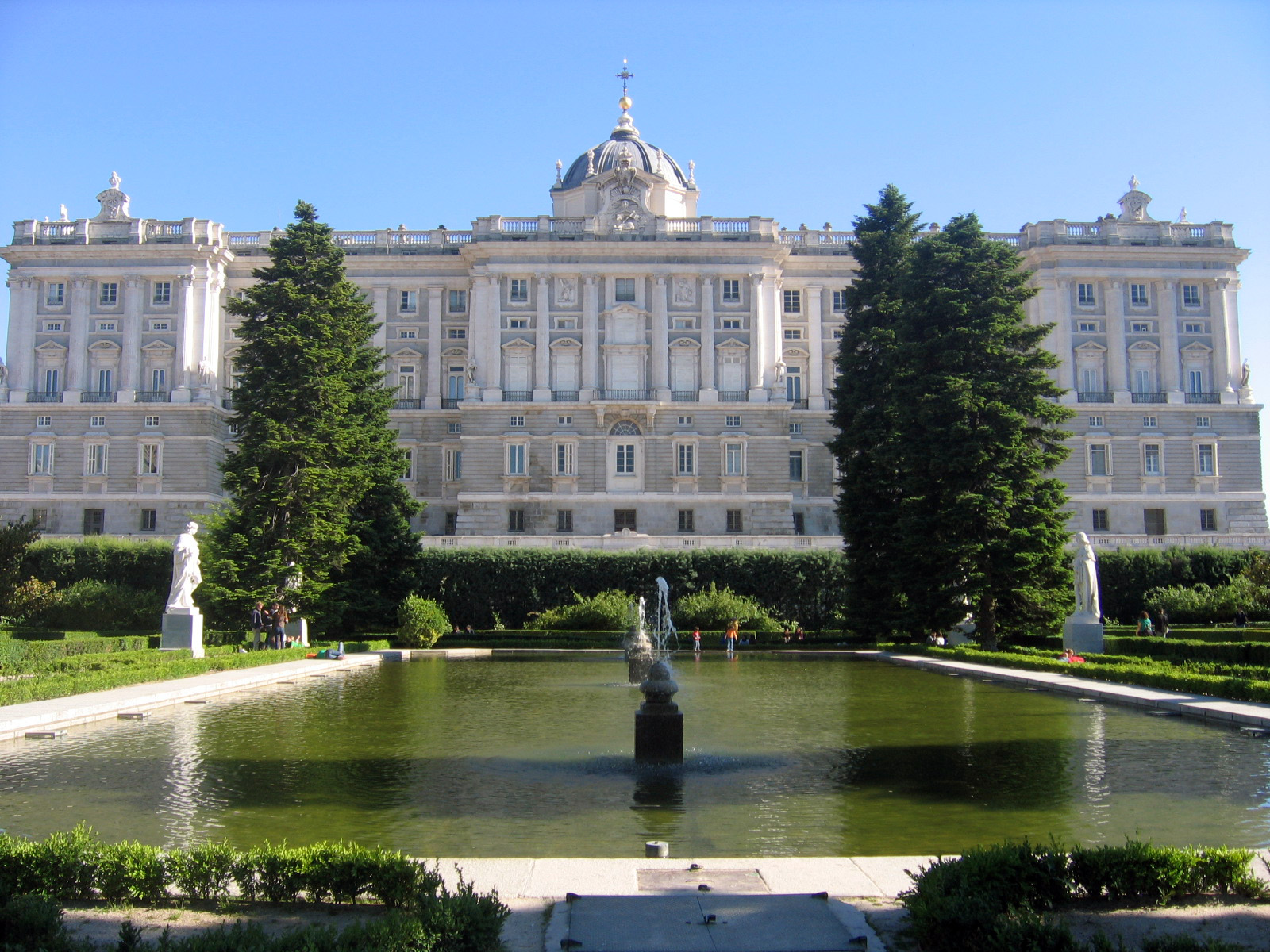A view of the Royal Palace and fountains in Madrid, Spain.