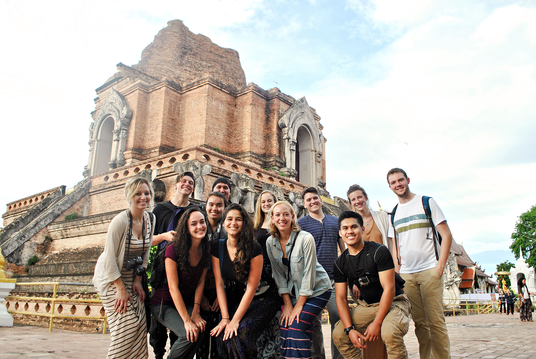 Students in front of a Thai temple (wat) in Chiang Mai, Thailand.