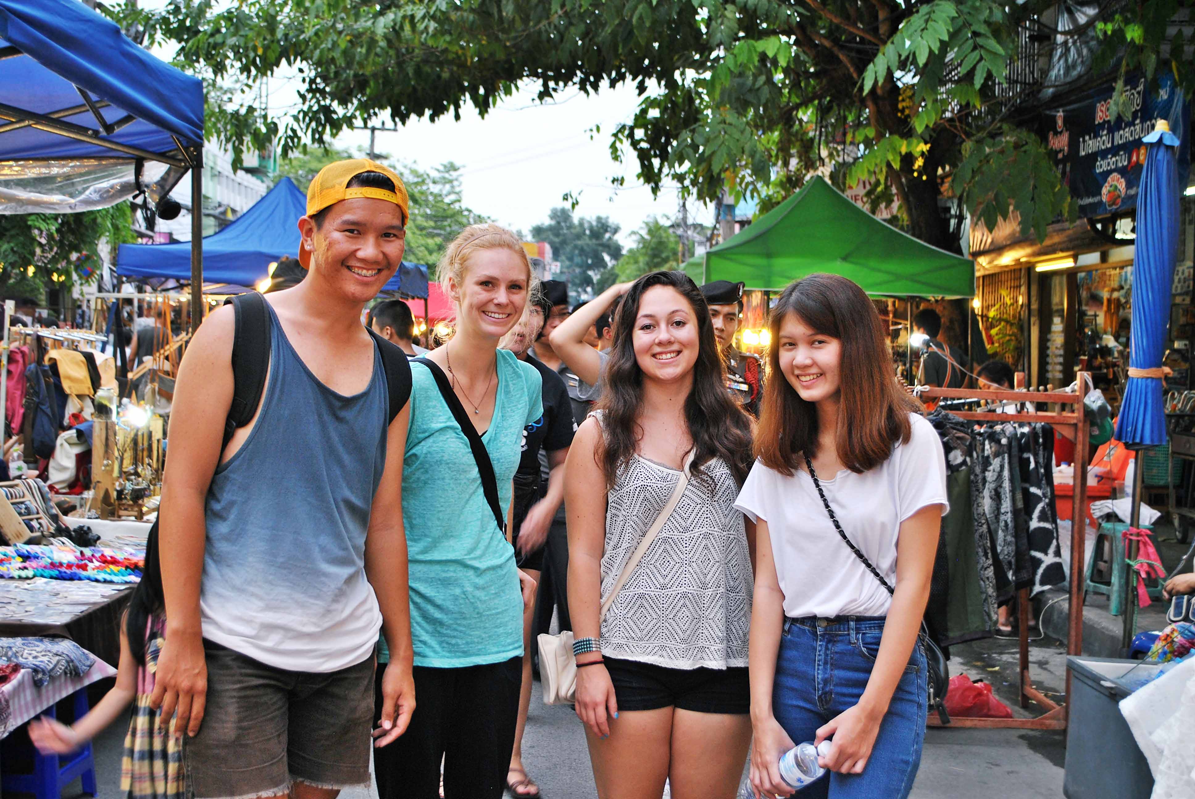Students exploring the Sunday street market in Chiang Mai, Thailand.