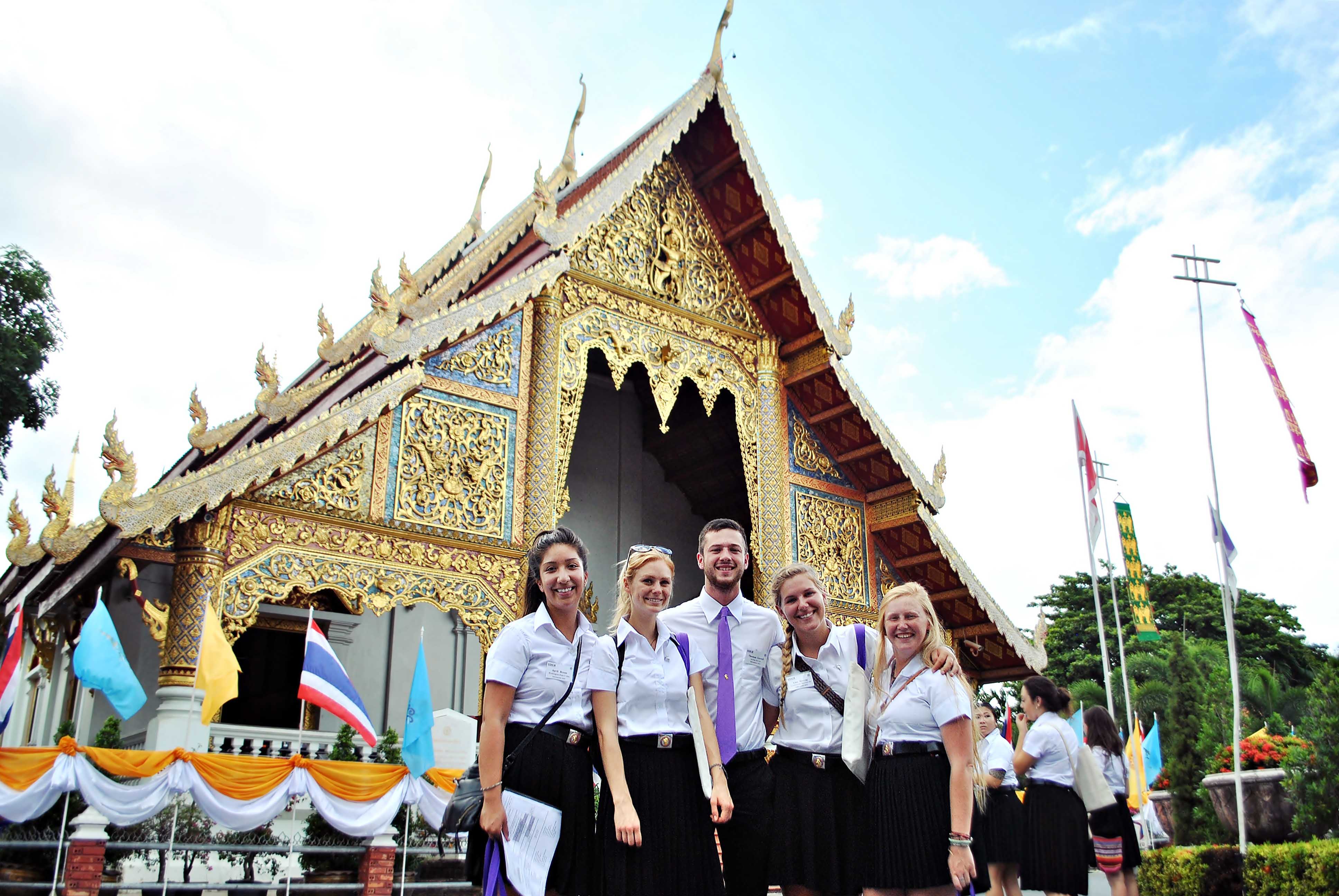 Students in front of one of the many temples in Chiang Mai, Thailand.