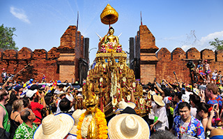 People gathering outside the old city of Chiang Mai, Thailand for the Songkran festival.